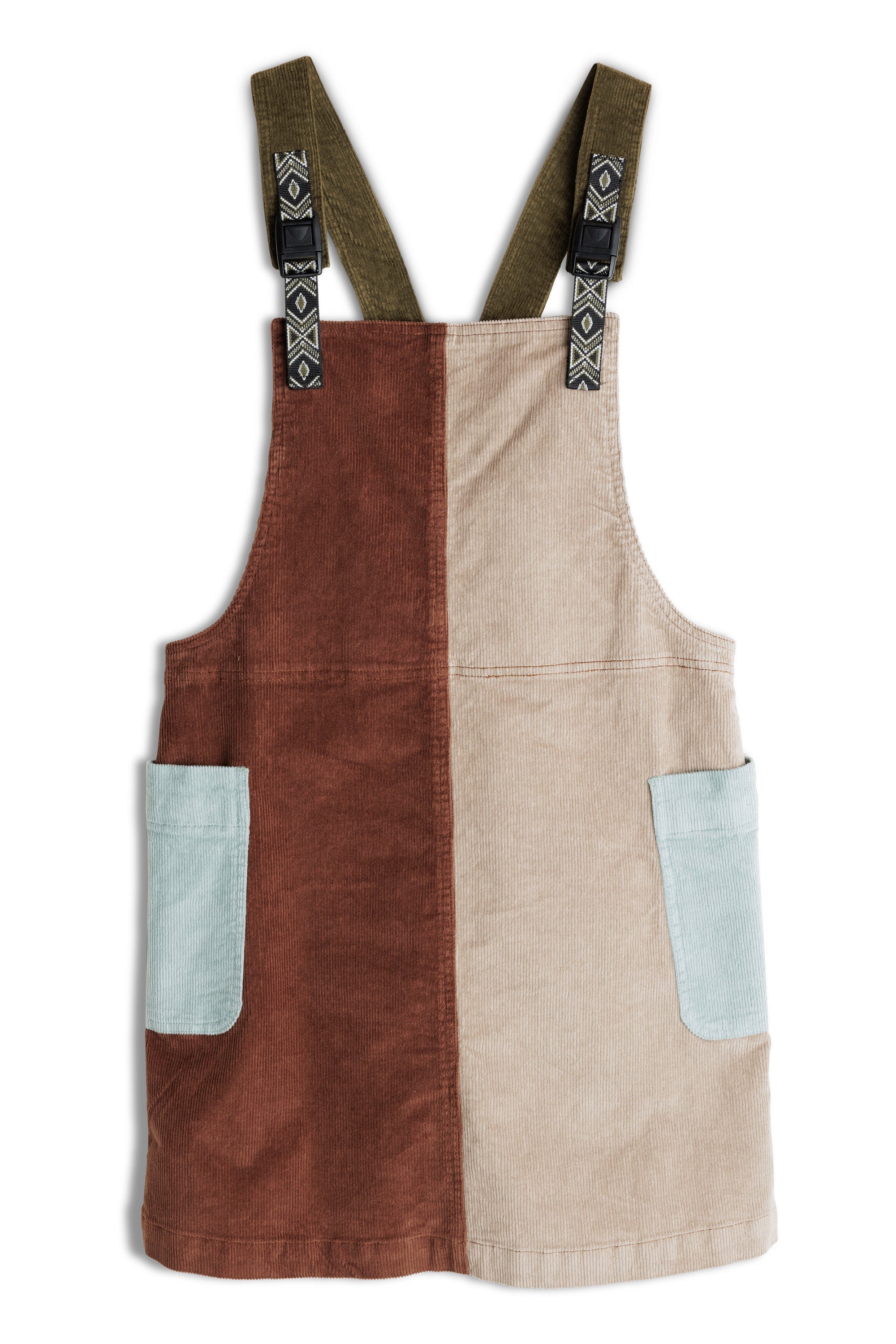 Colorblock corduroy jumper dress with adjustable straps, featuring rust, cream, and light blue panels with front pockets