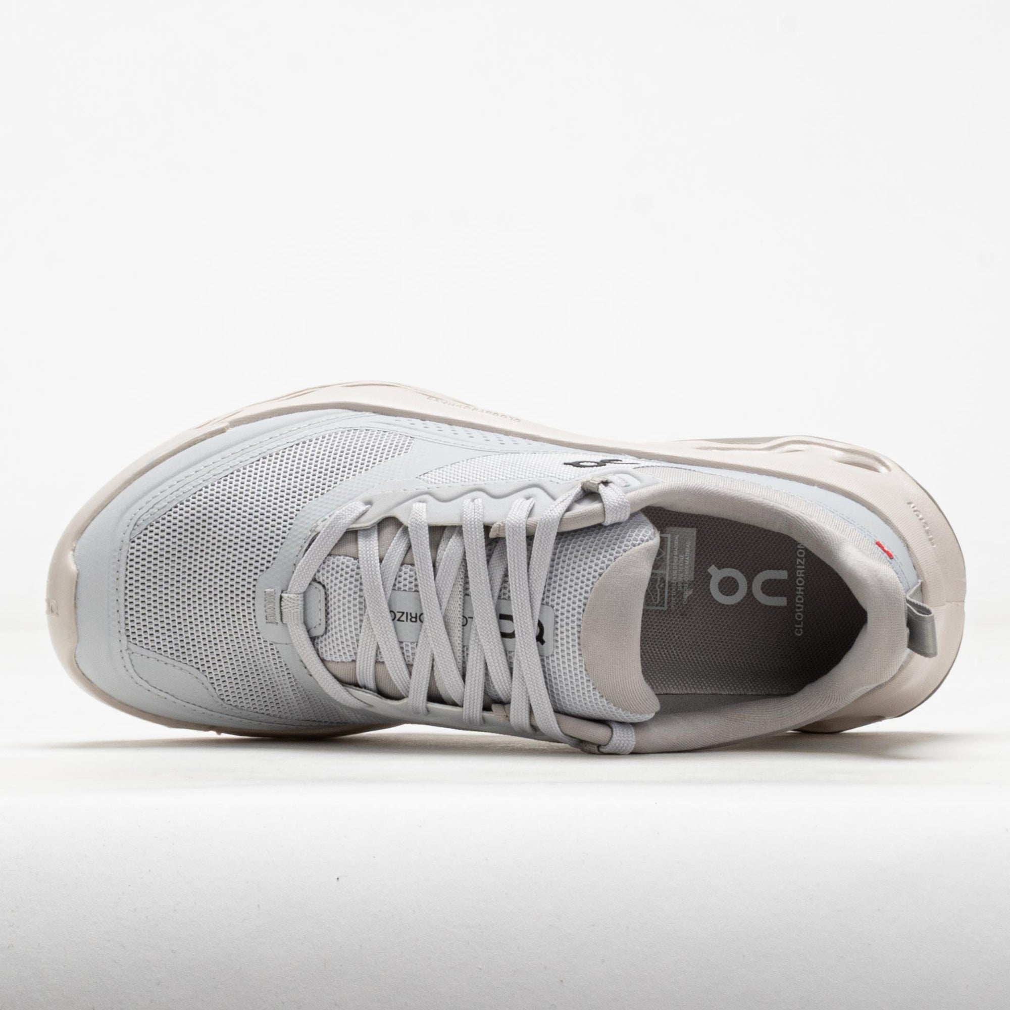 Light grey running shoe with mesh upper and laced closure, viewed from above