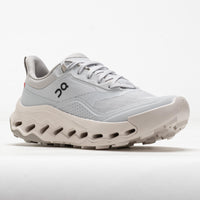 Light gray running shoe with distinctive chunky sole featuring ventilation holes, side profile view