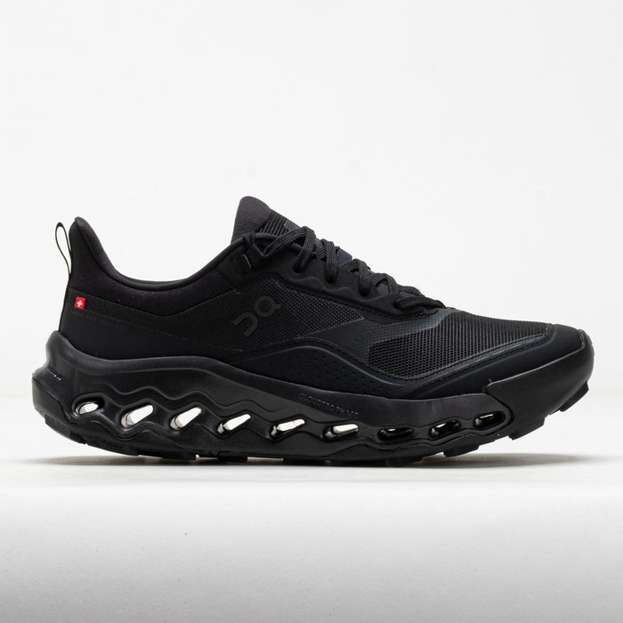 Black athletic running shoe with distinctive cloud-like sole cushioning system, side profile view