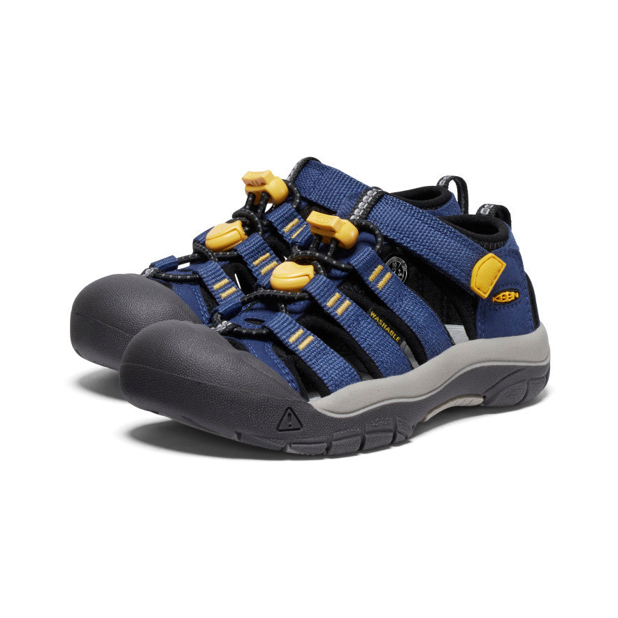 Navy blue water sandals with yellow cord toggles and protective toe cap