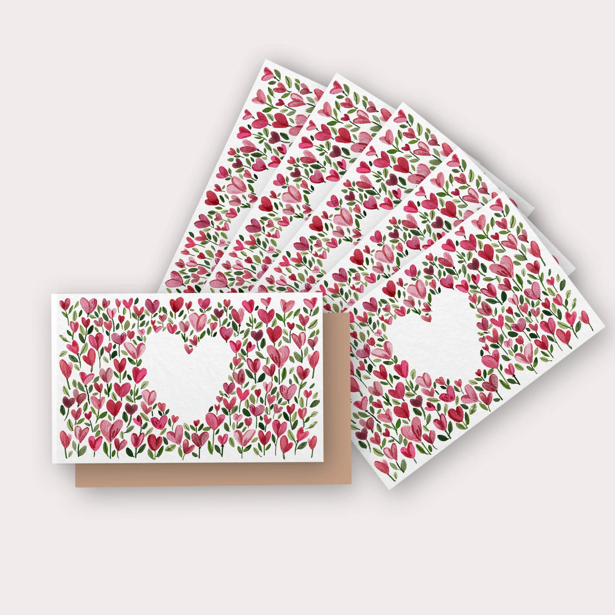 Greeting cards with pink and red heart-shaped flowers and green leaves pattern