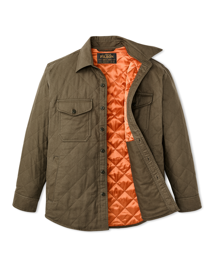 Quilted insulated shirt jacket in olive green, open to reveal orange diamond-quilted lining, flat lay view