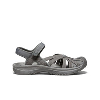 Gray outdoor sandal with adjustable ankle strap and textured toe protection, side view