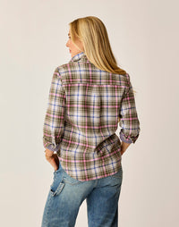 Women's plaid flannel shirt, back view, with rolled sleeves and relaxed fit