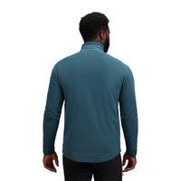 Man wearing teal fleece half-zip jacket, shown from behind against white background