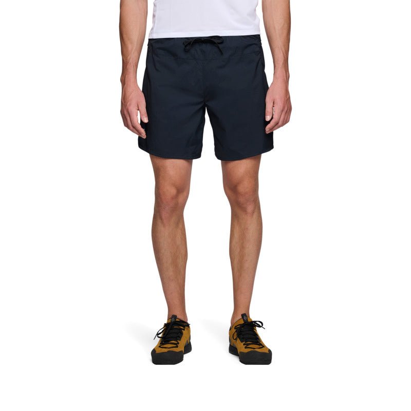 Dark navy athletic shorts with drawstring waist worn by male model