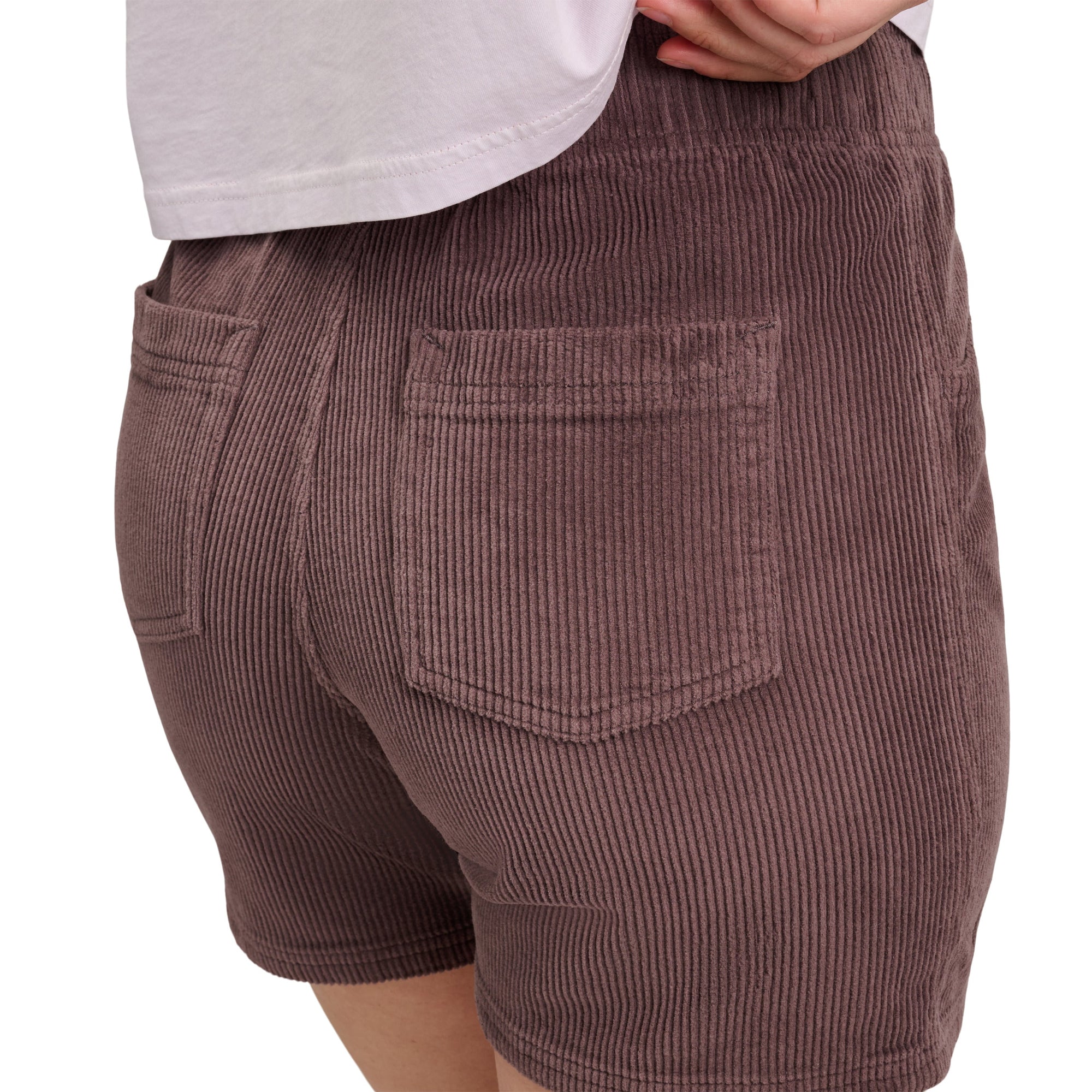Corduroy shorts with elastic waistband and back pockets, side view on model