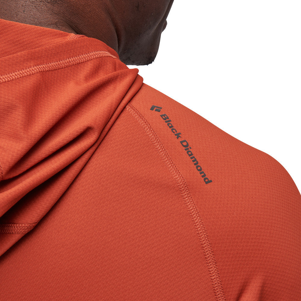 Orange hooded pullover with quarter-zip closure and kangaroo pocket, detail view