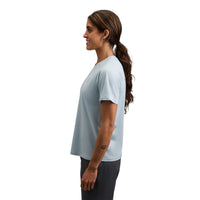 Light blue short sleeve tee shirt shown from side profile on woman with ponytail