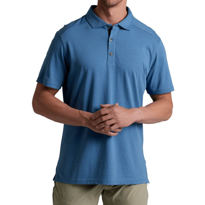 Medium blue polo shirt with collar and button placket, front view on model