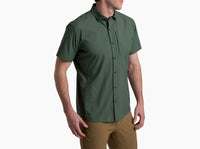 Men's short-sleeve button-up shirt in dark green with chest pocket, side angle view