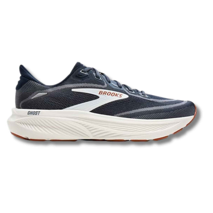 Navy blue running shoe with mesh upper, white midsole and orange outsole accents, side view