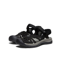Black closed-toe sport sandals with adjustable straps and protective toe coverage, side angle view