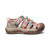 Children's closed-toe sandal with colorful floral straps and beige protective toe cap, side view