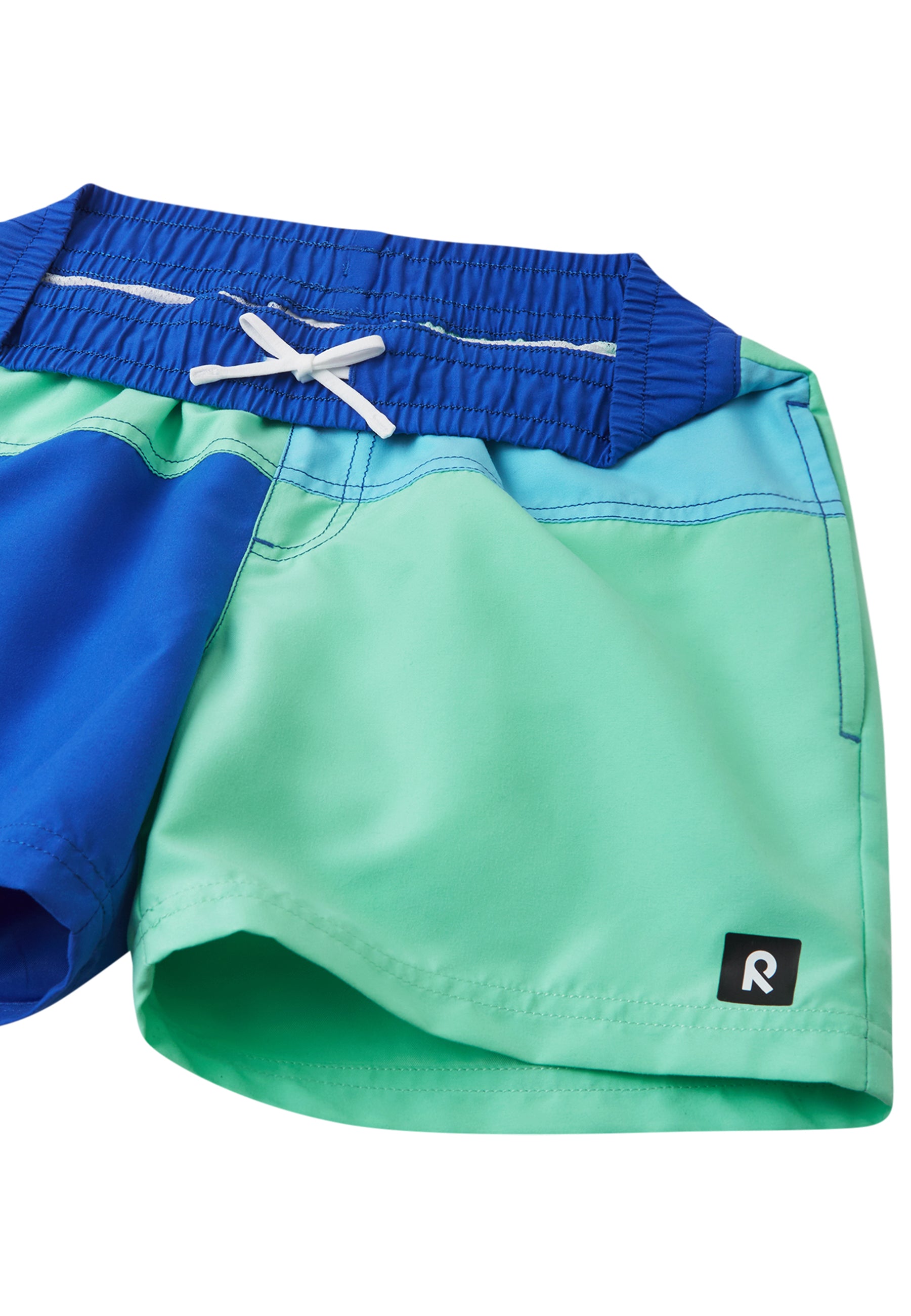 Children's swim shorts with blue and green colorblock design, elastic waistband and drawstring