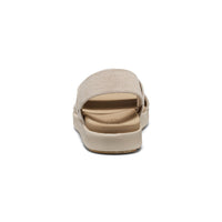 Beige canvas backstrap sandal with adjustable heel strap, rear view showing sole and footbed