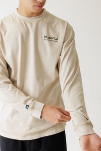 Men's long-sleeve crew neck tee in light beige with chest logo print, on-model front view