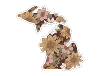 State-shaped sticker with vintage floral pattern featuring tan and pink flowers on brown background