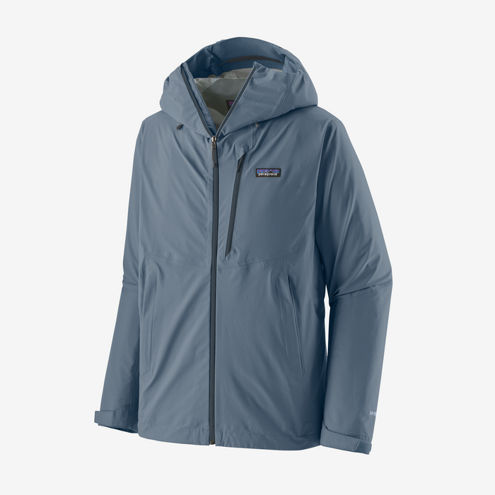 Blue-gray hooded jacket with full zip front and chest pocket, studio view