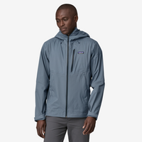 Blue-gray hooded rain jacket with full zip and chest pocket, worn by model