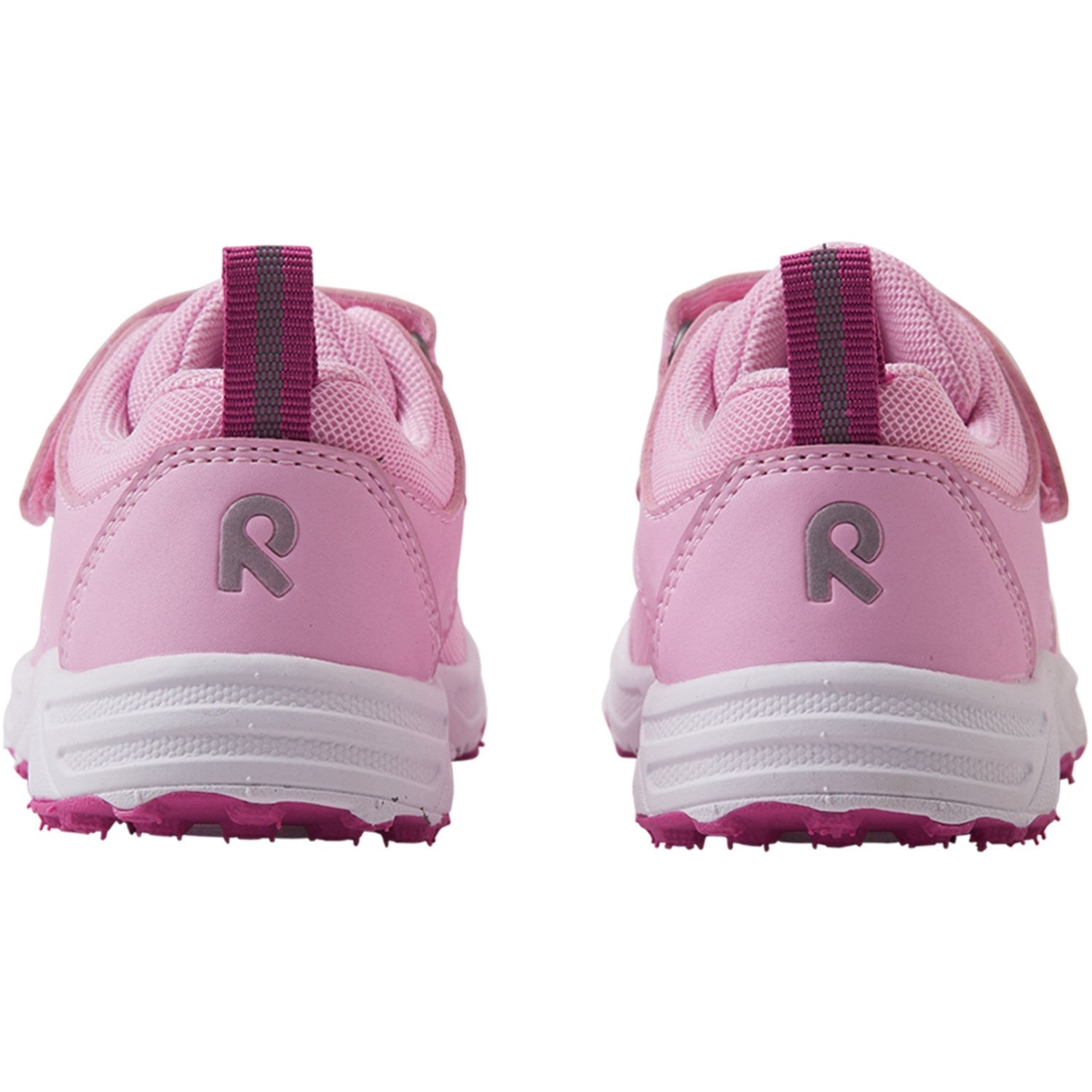 Pink children's athletic sneakers with velcro straps and textured soles, rear view