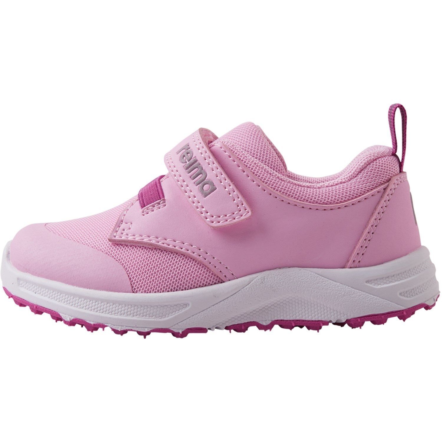 Pink children's athletic sneaker with velcro strap and textured sole, side view