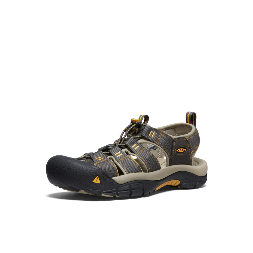 Outdoor sport sandal with protective toe cap, adjustable straps, and rugged sole in dark gray
