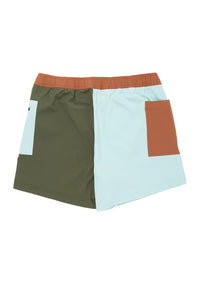 Color-blocked shorts with elastic waistband featuring green, blue, and orange panels in geometric pattern