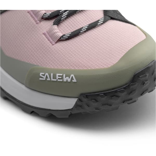 Mid-height hiking boot with pink textile upper and olive green midsole, side detail view