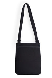 Black crossbody bag with adjustable strap and zippered front pocket, front view