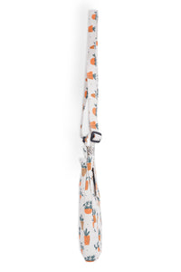 White lanyard with orange potted plant and green leaf pattern, featuring black clip attachment