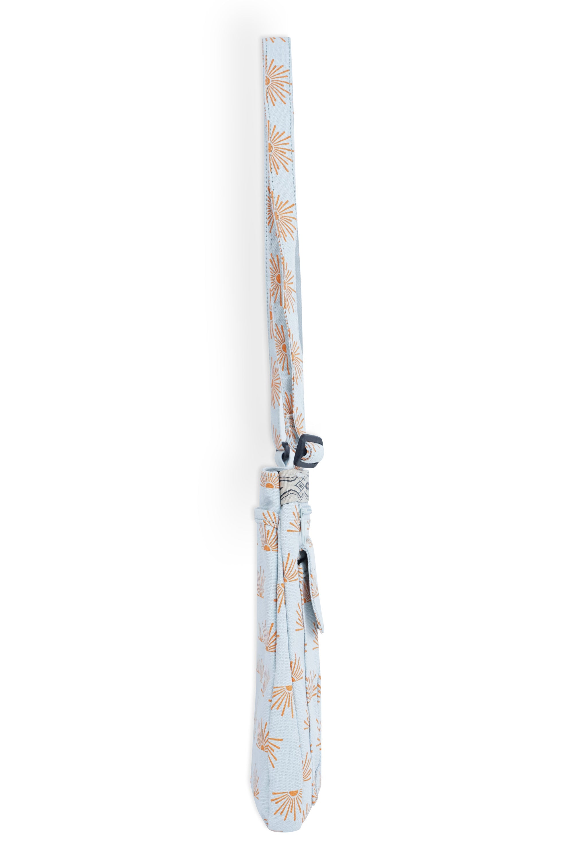 Light blue crossbody bag with orange sunburst pattern and adjustable strap