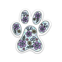 Paw print shaped sticker with purple flowers and green foliage pattern on white background