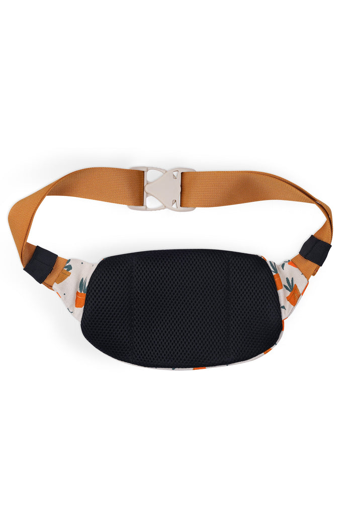 Canvas waist pack with cactus print fabric, black mesh back panel and orange adjustable strap