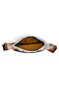 Canvas crossbody bag with fox and plant pattern, shown open displaying interior compartment