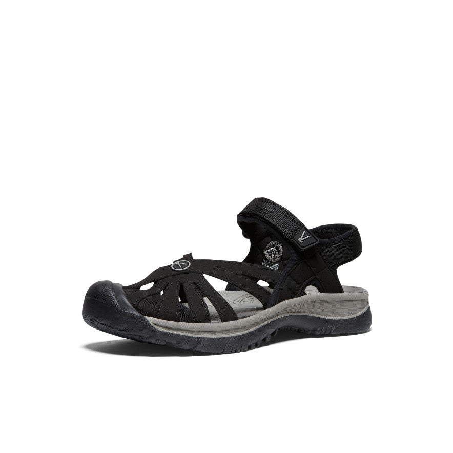 Black sport sandal with adjustable straps and gray midsole, side angle view
