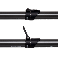 Two-piece kayak paddle shaft showing adjustable locking mechanism with measurement markings
