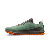 Trail running shoe in green with orange lugged outsole, lateral side view