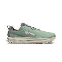 Trail running shoe with mint green upper, beige midsole, aggressive lug outsole, lateral view