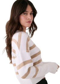 White knit sweater with beige striped pattern, three-quarter sleeves, worn by model