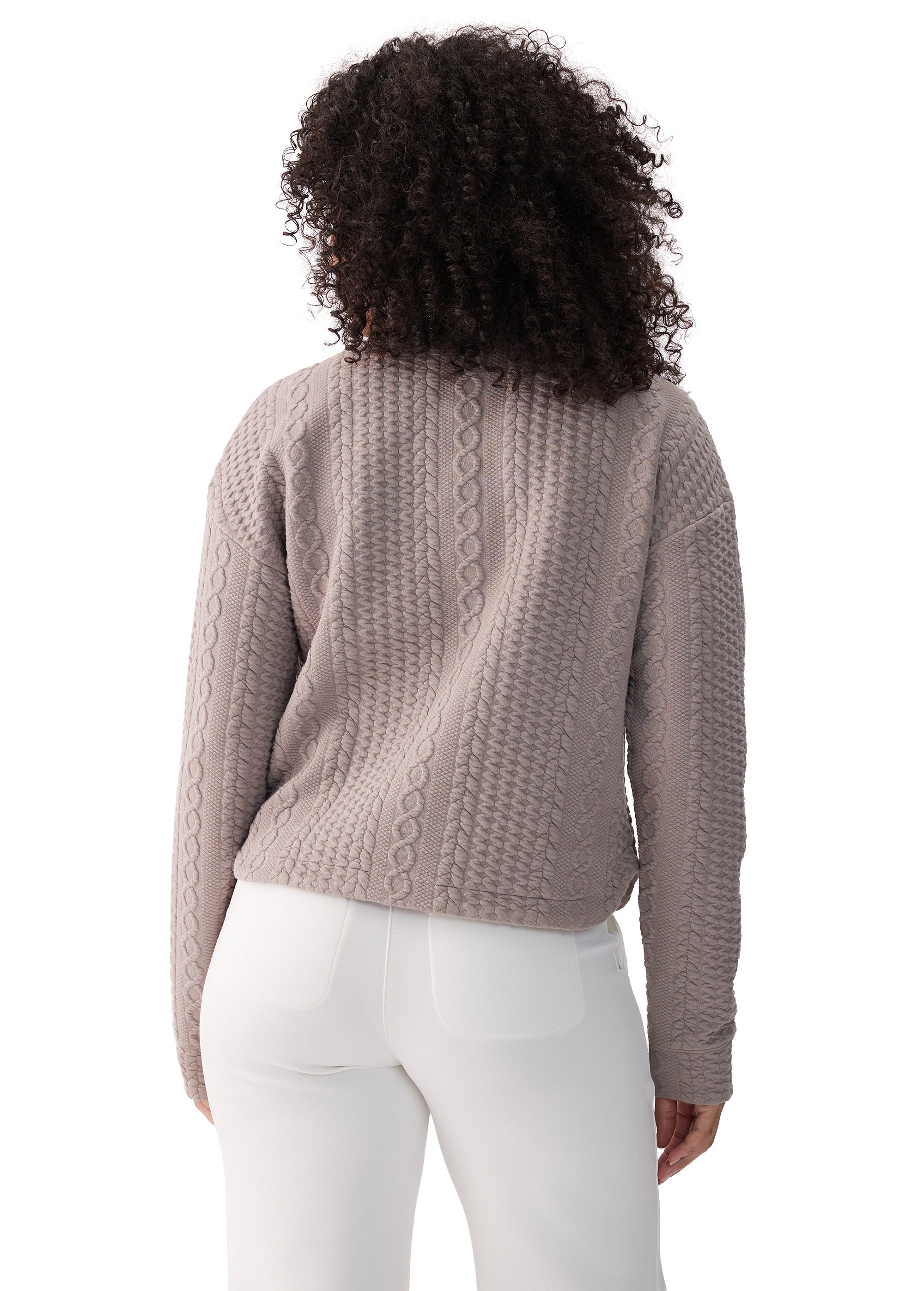Women's cable-knit long sleeve pullover top, back view, shown in warm taupe