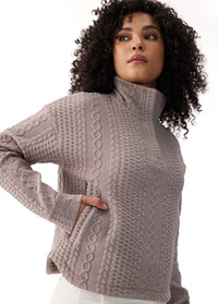 Women's cable-knit textured mock neck long sleeve pullover top, three-quarter front view