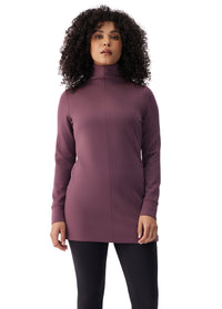 Women's long-sleeve turtleneck tunic in deep plum, front view, worn with black leggings