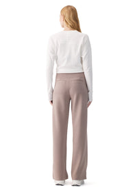 Wide-leg pants in taupe-pink, back view on model, showing patch pockets and straight silhouette