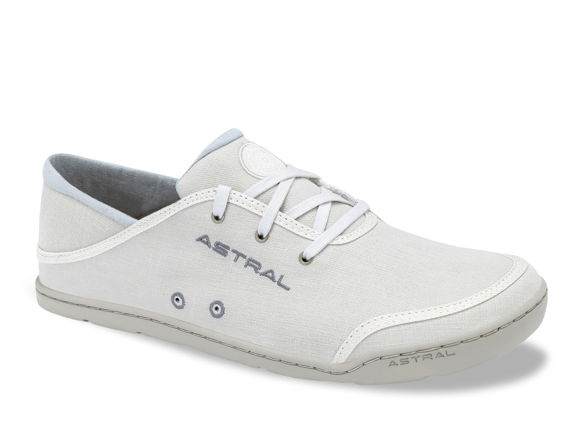 Light gray canvas sneaker with white laces and blue trim, side angle view