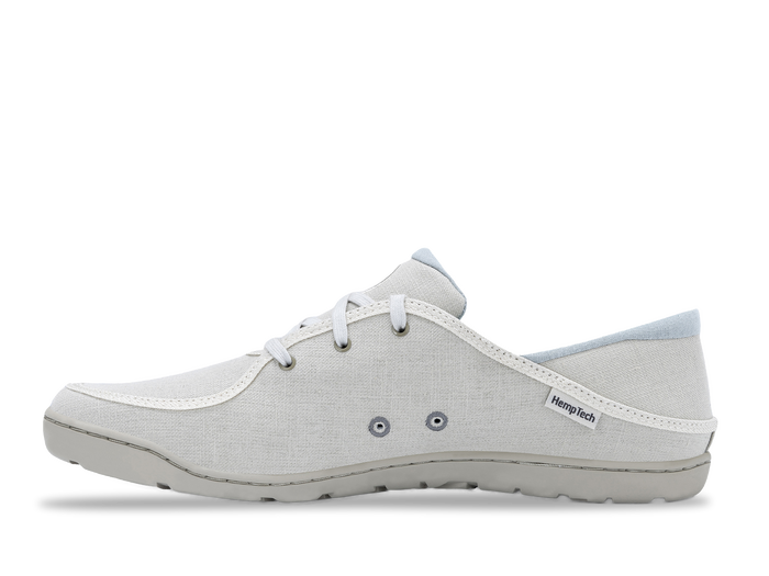 Light gray canvas casual shoe with white laces and rubber sole, side profile view