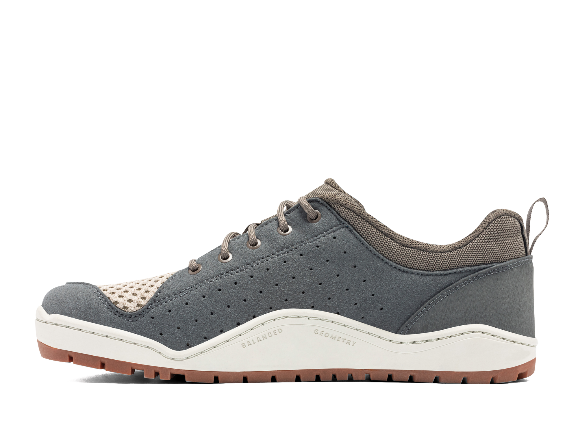Gray outdoor sneaker with perforated upper, cream mesh toe, and brown rubber sole, side view