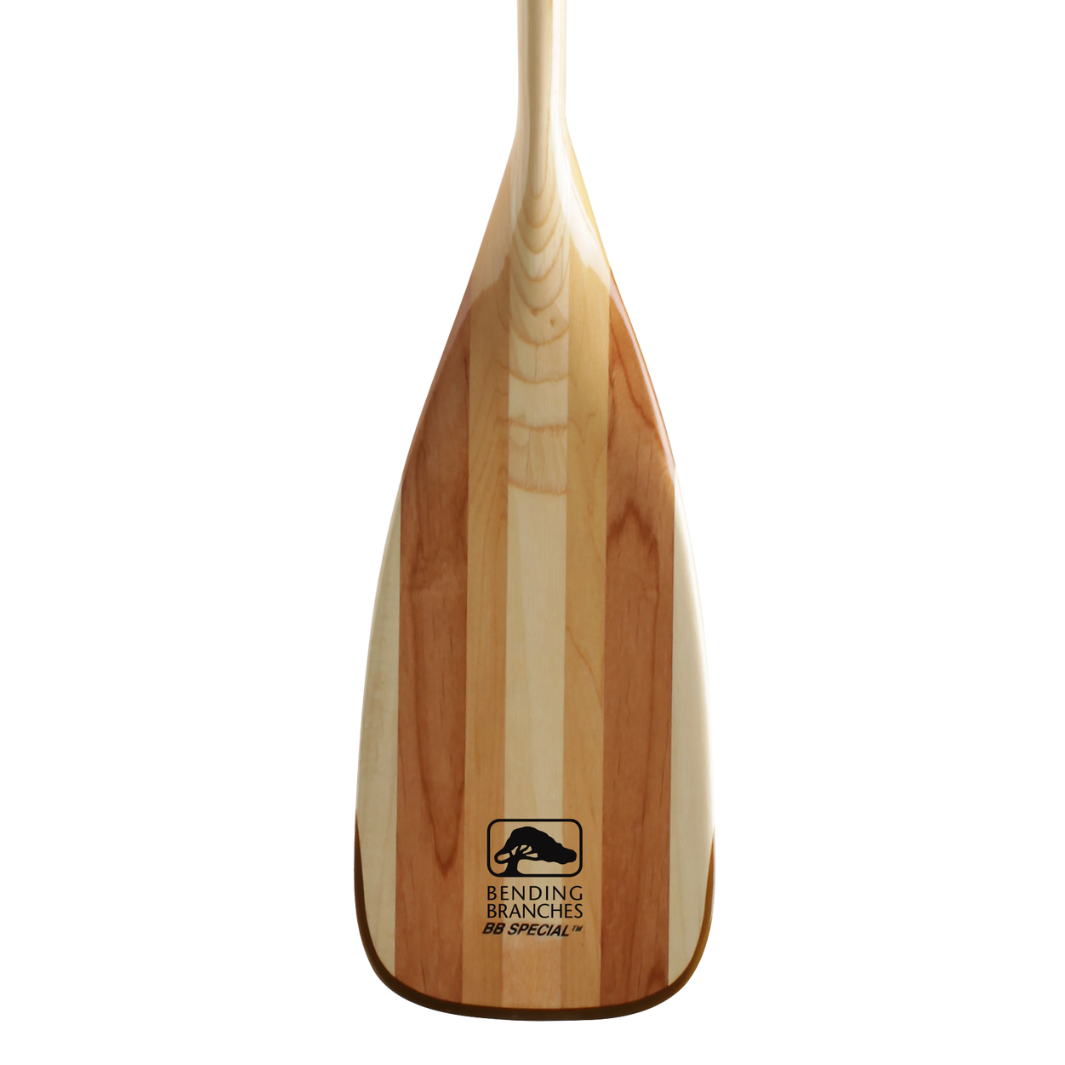 Wooden paddle with laminated wood construction showing natural grain patterns and curved blade design