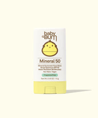 Yellow mineral sunscreen face stick in packaging with cute monkey mascot design